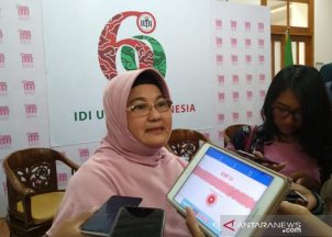 dr Erlina Burhan