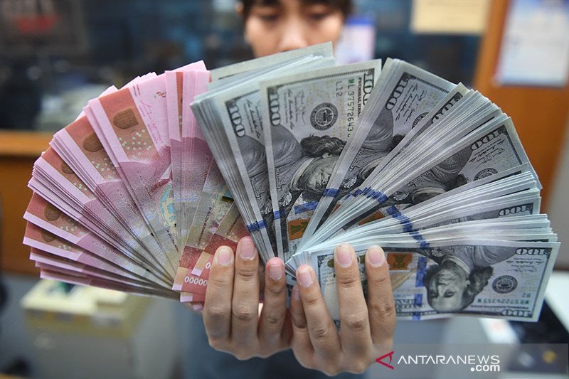 uang rupiah dan dolar AS