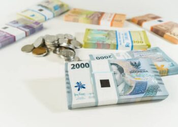 Hukum Tukar Uang Receh Baru untuk THR Lebaran