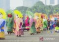 Ondel-ondel Meriahkan Puncak Perayaan HUT Jakarta di Monas. Foto: Antara